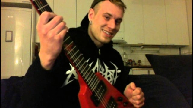 PLAYING GUITAR LEFT-HANDED